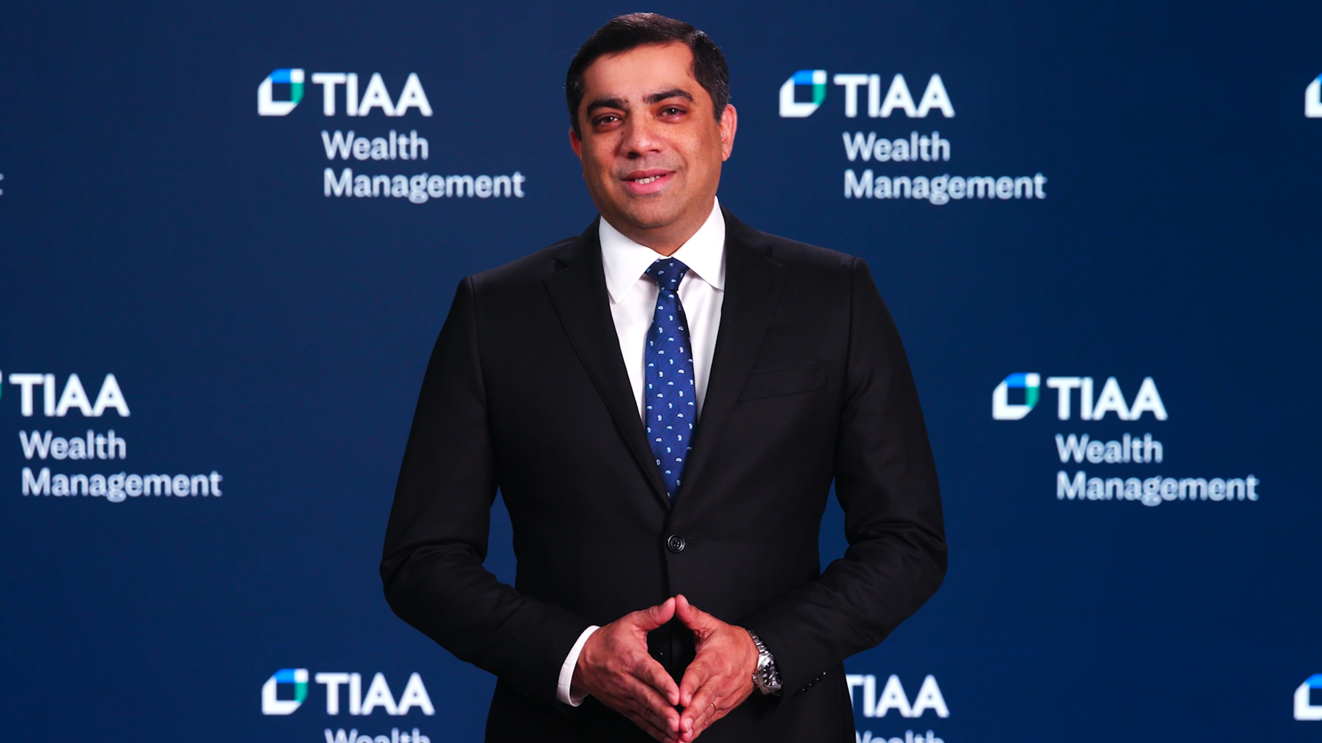 Neel Mukherjee speaking about TIAA’s 2025 macroeconomic outlook and wealth implications